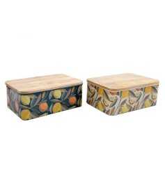 Add a fresh summer touch to your kitchen with delightful citrus canisters featuring a warm wooden lid.