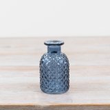 Add a touch of charm to your space with thgis blue bottle flower vase 