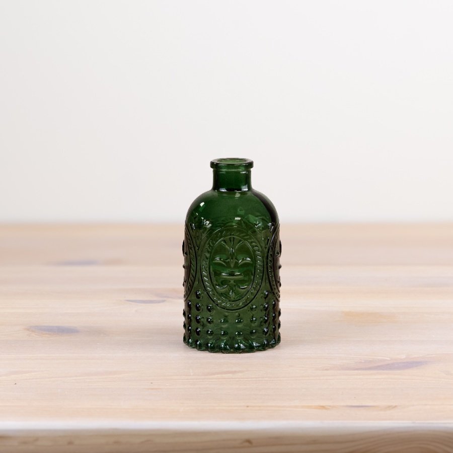 Add style to your home with this beautiful green bottle vase - perfect for creating an elegant space.