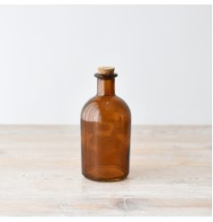 Elevate your decor with our stunning Glass Bottle With Painted Cork. Handcrafted elegance for your home.