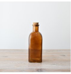 Add a touch of charm and character to your space with our elegant Glass Bottle With Cork With Painting 