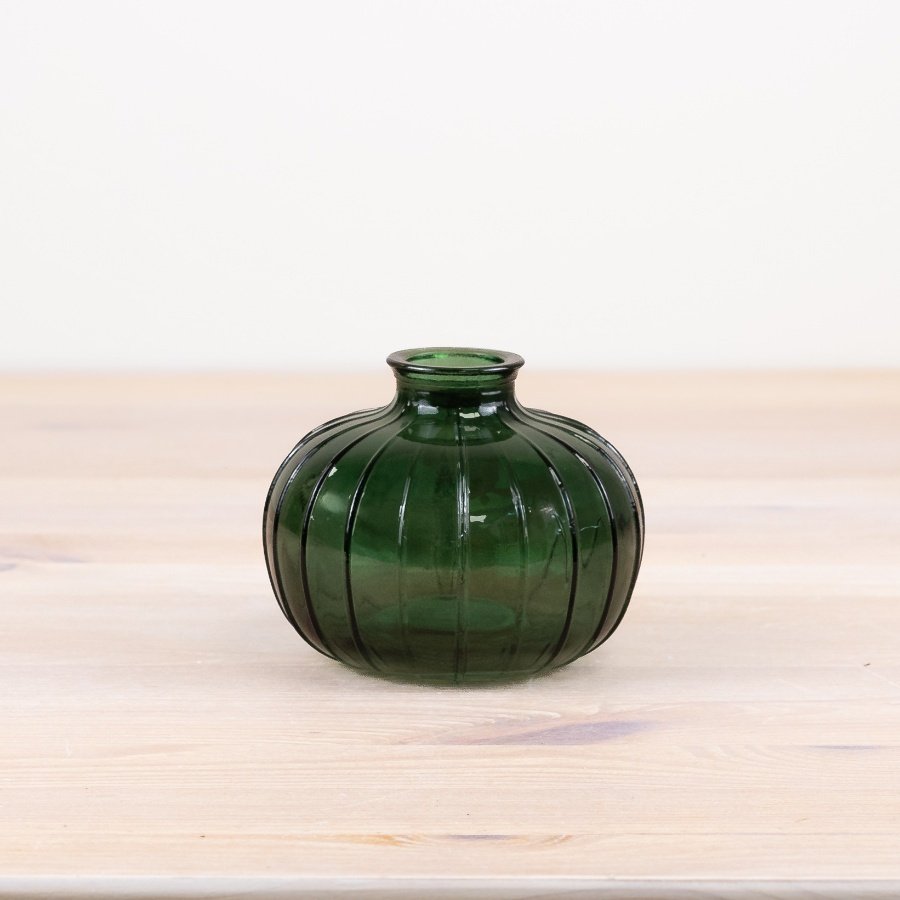 Elevate your decor with a stylish green vase for a touch of sophistication in your home.