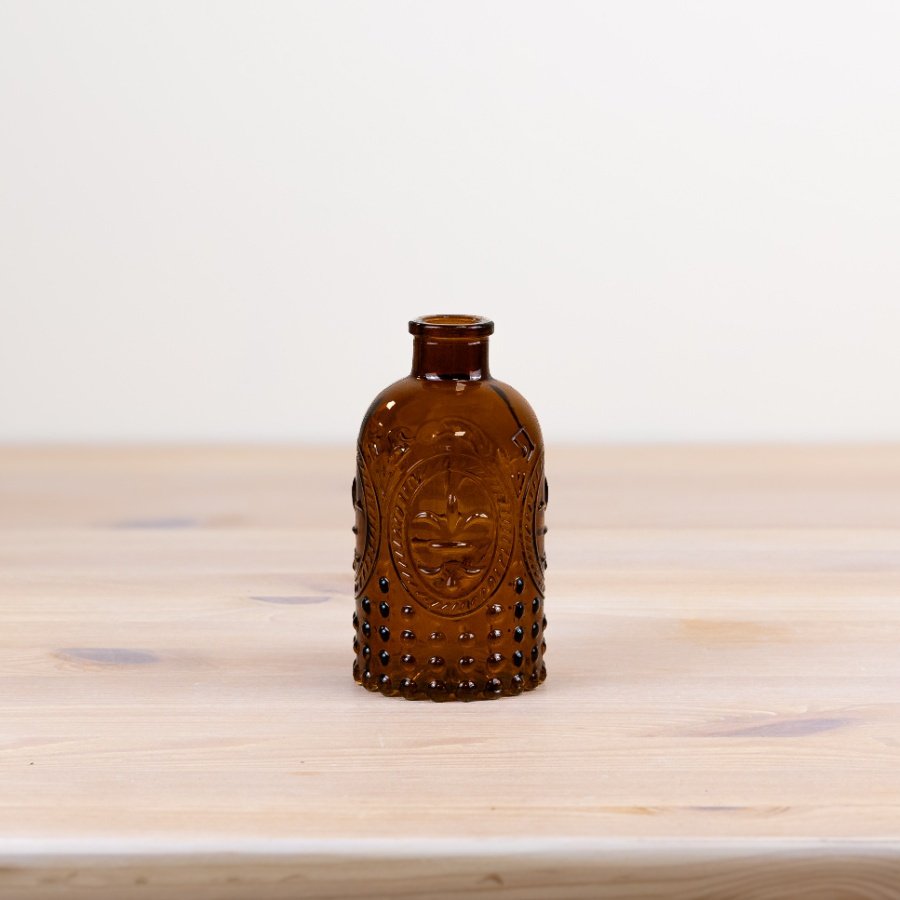 Bring sophistication to your home decor with our stylish brown bottle vase, perfect for any room