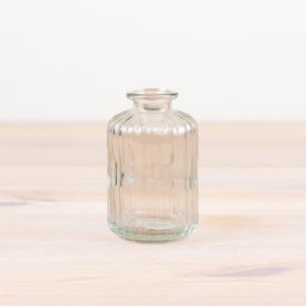 Gorgeous translucent vase made of high-quality glass for a striking centerpiece.