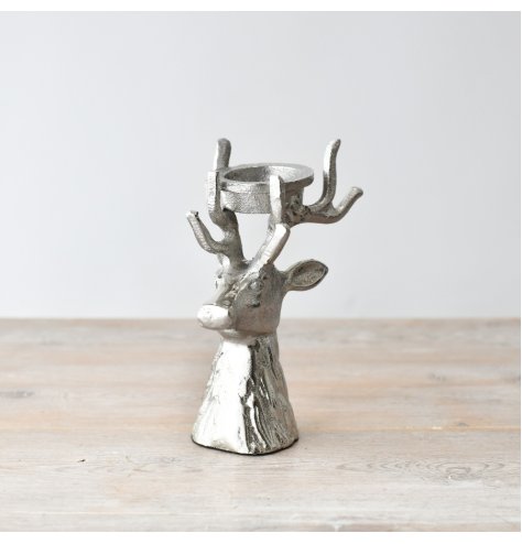 Enhance your holiday decor with our elegant Raw Alum Reindeer and T Light for a rustic touch of charm.