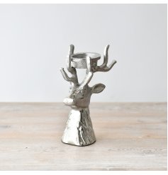 Elevate your holiday decor with our exquisite Raw Alum Reindeer and T Light - a charming balance of rustic and eleganc