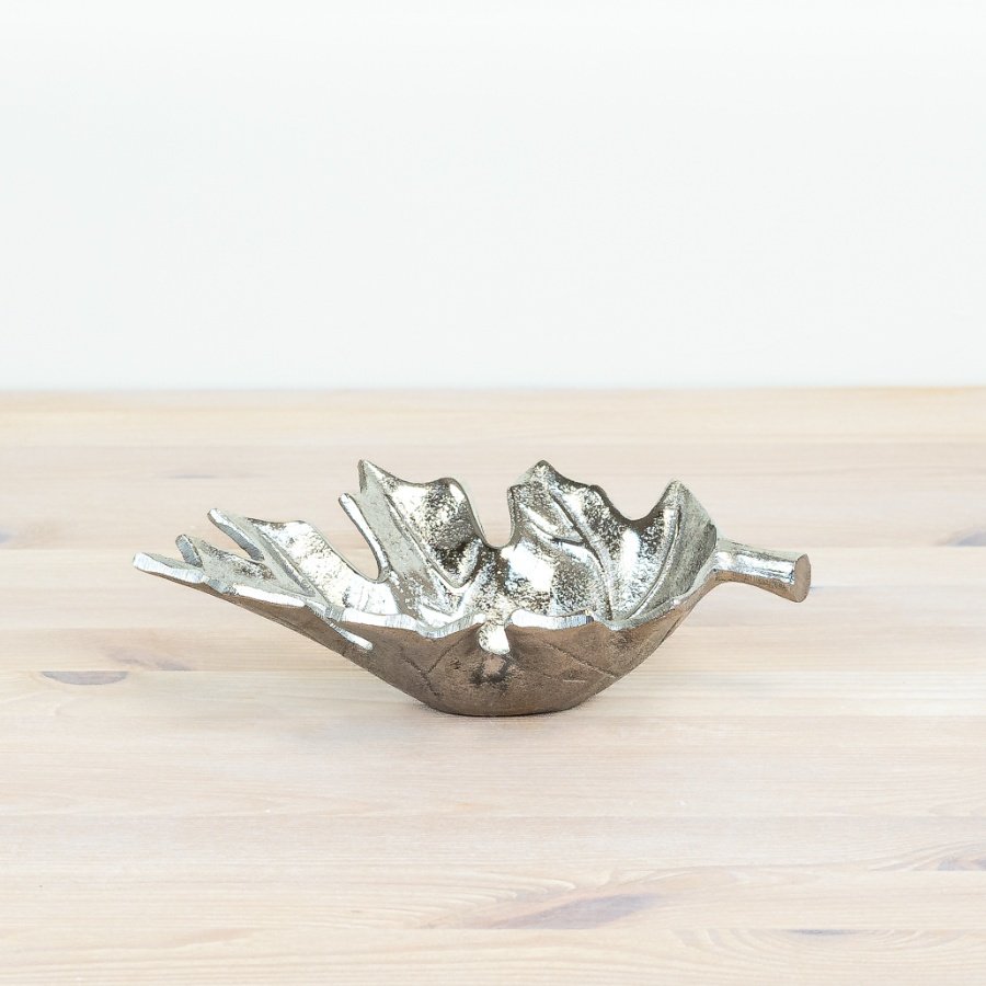 Enhance your table setting with our exquisite leaf trinket dish for a touch of sophistication.