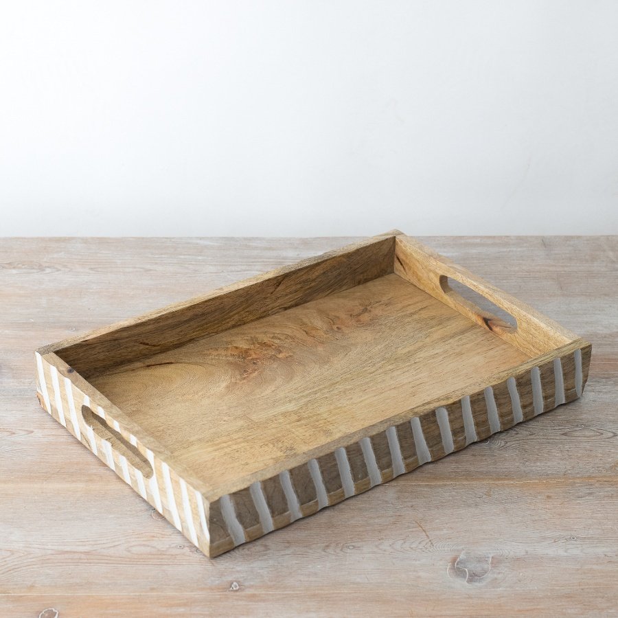 Add elegance to your home with our must-have wooden tray. Perfect for serving with style.