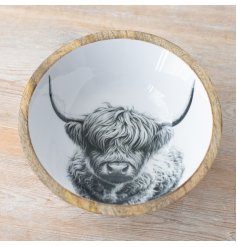 Infuse rustic charm into your kitchen with our enamel Highland Cow bowl. 