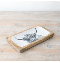 Add Scottish flair to your home with our Enamel Tray showcasing a Highland Cow design. 