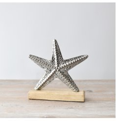 Add a touch of seaside elegance to your home with our stunning "Star On Base" decoration,