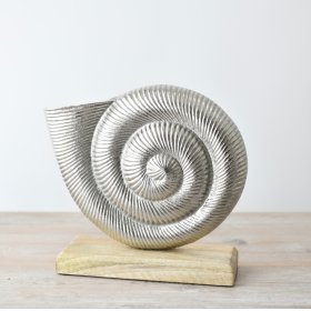 Enhance your space with our Raw Alum Shell On Base. A modern touch of elegance for any home