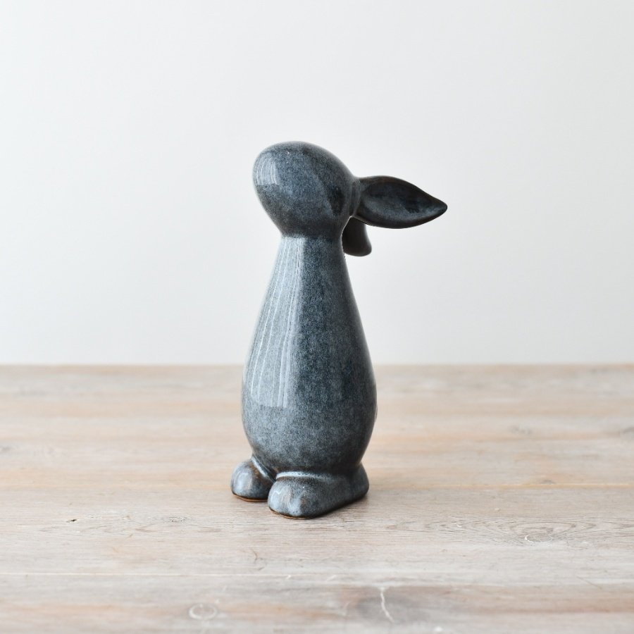 Embrace the charm of our Bunny stoneware figurine. Perfect for any bunny lover's collection.