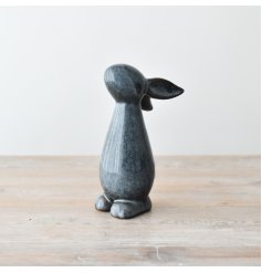 Hop into cuteness with our Bunny stoneware figurine. 