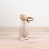 Hop into cuteness with our Bunny stoneware figurine. 