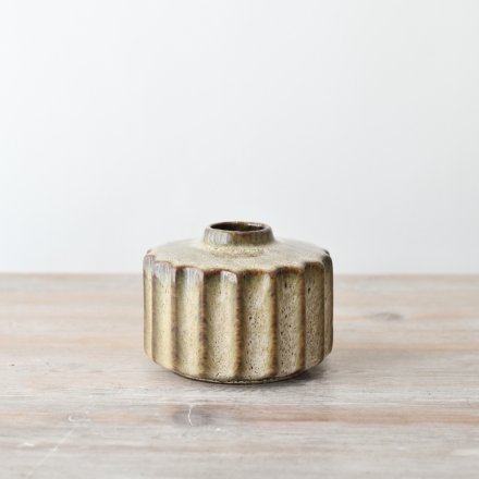 A stunning stoneware minimalist vase can be a great table centerpiece.