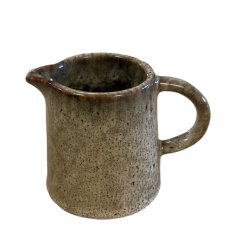 Enhance your table setting with this charming small jug.
