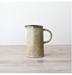 Elevate your table with a glazed jug for a Scandinavian touch.