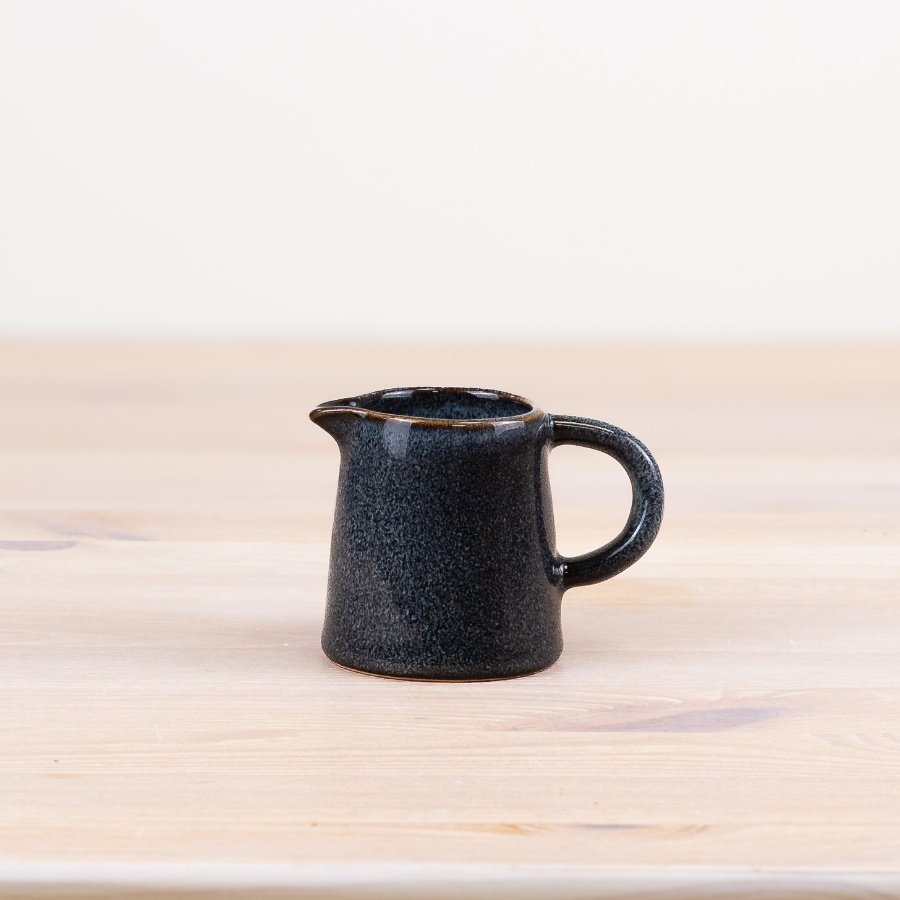 Elevate your kitchen with a beautiful navy jug for a touch of elegance.