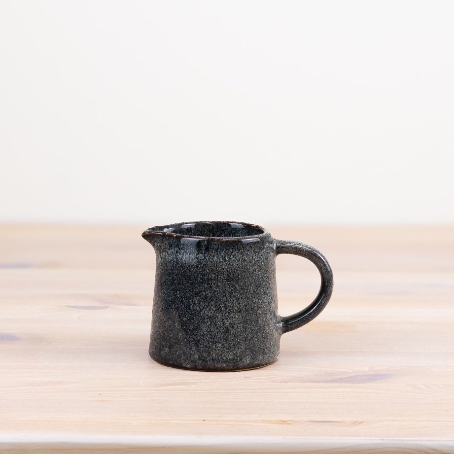 Elevate your home decor with this two-tone deep blue jug, featuring a rustic yet modern design. Perfect for a minimali