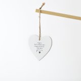 Meet the adorable Angels, a heartwarming porcelain ornament that celebrates the love of our furry friends. 