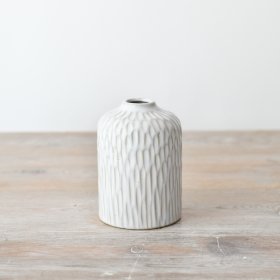 Elevate your home decor with a stunning porcelain vase that adds elegance to any room.