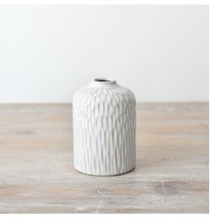 Add a touch of sophistication to your living space with our beautiful porcelain vase.