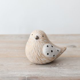 Add a whimsical touch to your décor with our high-quality terracotta bird ornament. 