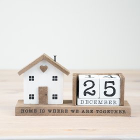 Enhance your decor with our Wooden House Calendar - perfect for adding a touch of rustic charm to any space.