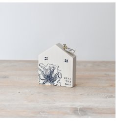 Seas the day with our charming Wooden House, the perfect coastal-inspired addition to any home.