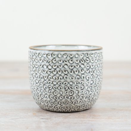 Add a touch of elegance to your home with our stunning ceramic flowerpot, 