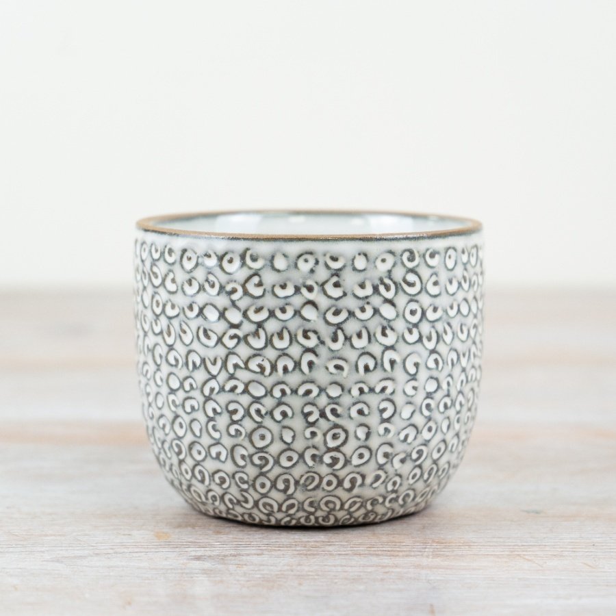 Enhance your home with style using our exquisite ceramic flowerpot