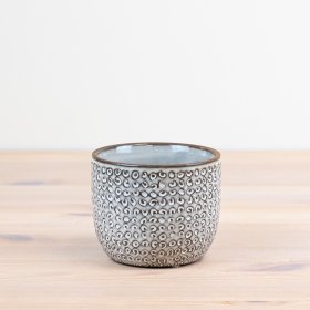 Add sophistication to your decor with our exquisite ceramic planter - elevate your space in style.