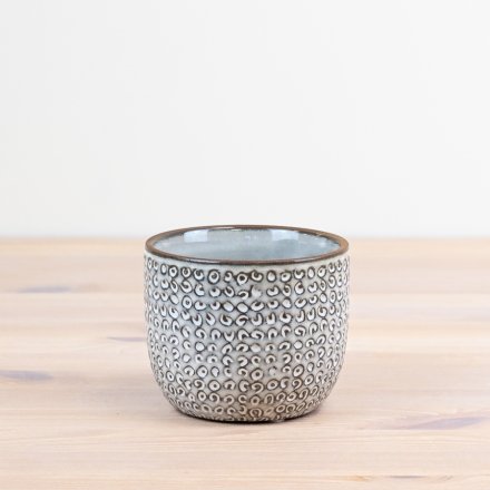 Bring a touch of elegance to your space with our stunning ceramic flowerpot