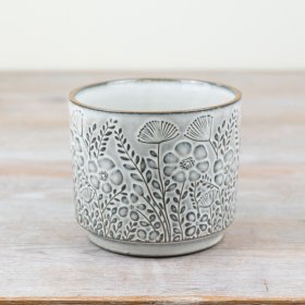 Revitalize your home with our stunning ceramic flowerpot, exuding grace and charm in every detail. 