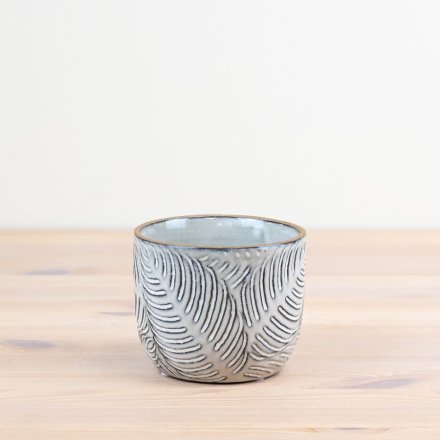 a stylish leaf design planter in a natural grey colour way 