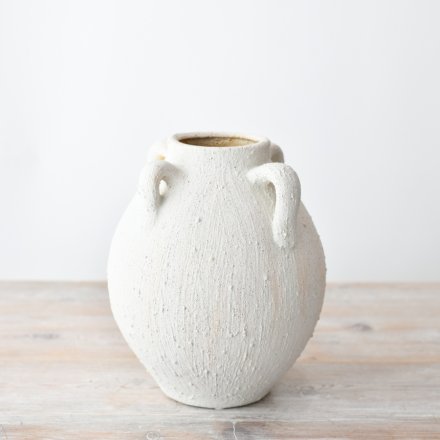 Elegant floral vase in a neutral tone color palette.
