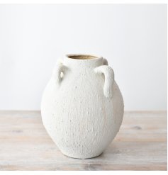 Elegant floral vase in a neutral tone color palette.