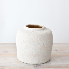 Enhance your living space with our exquisite ceramic vase – a perfect balance of sophistication and style.