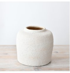 Bring style to your space with our chic ceramic vase, adding a touch of sophistication to any room.