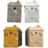 Transform your home into a cozy haven with the charming Eden Small House Shaped Oil Burner. 