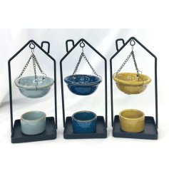 Transform your space into a serene oasis with the Eden Hanging Oil Burner