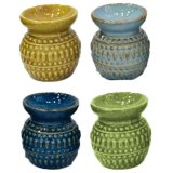 Transform your home into a tranquil oasis with the Eden Small Dotty Embossed Oil Burner