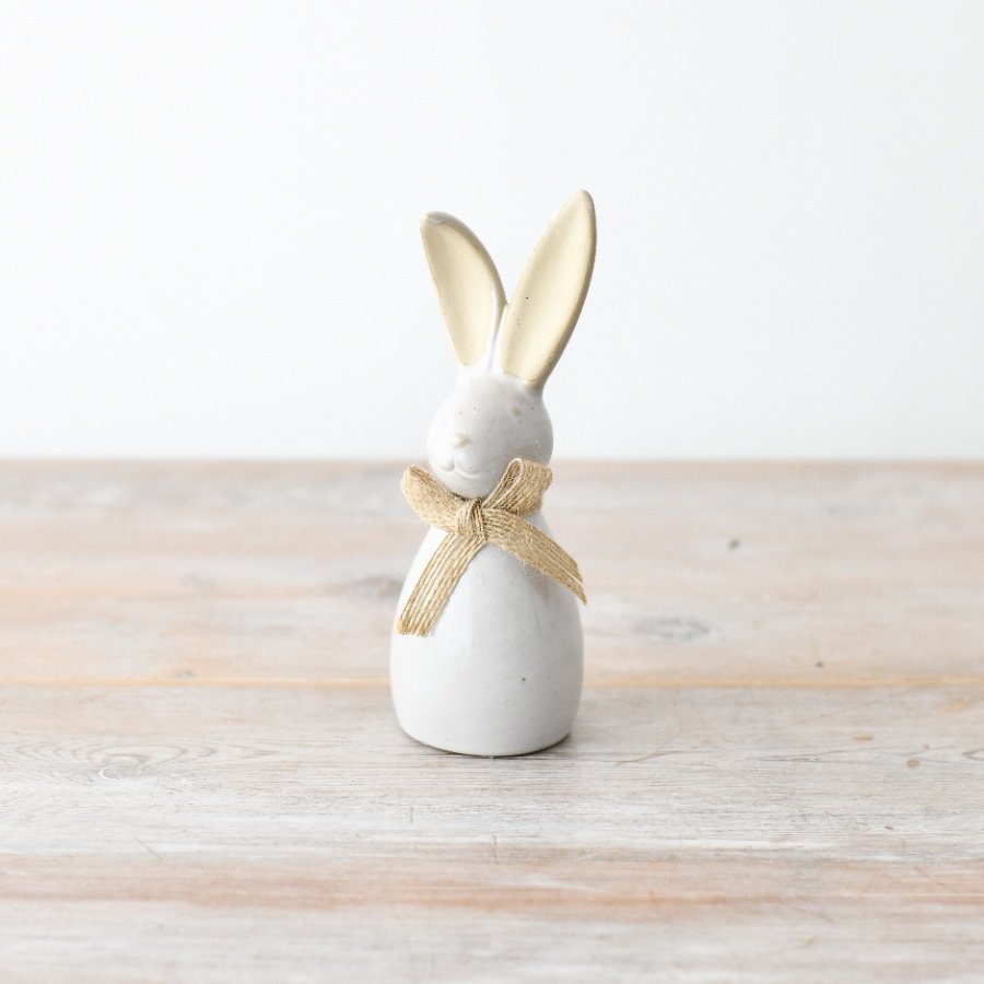 Spice up your Easter decor with a charming bunny figurine that's sure to add a playful touch to your holiday!