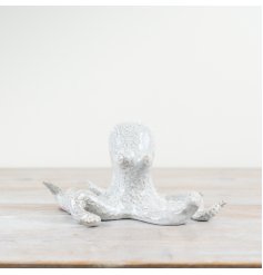 Unleash the beauty of the ocean into your home with our stunning octopus ornament