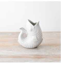 A gorgeous white fish vase finished with a simple glaze. 