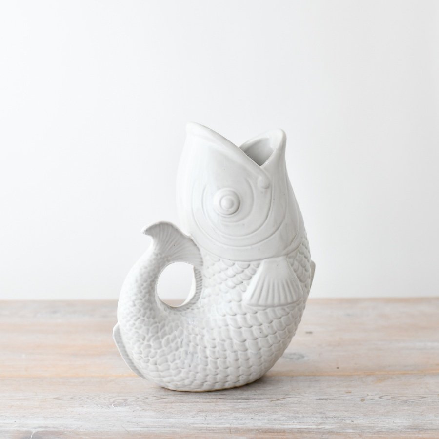 A sleek white fish vase with a clear glaze, perfect for adding a touch of elegance to your home decor. 