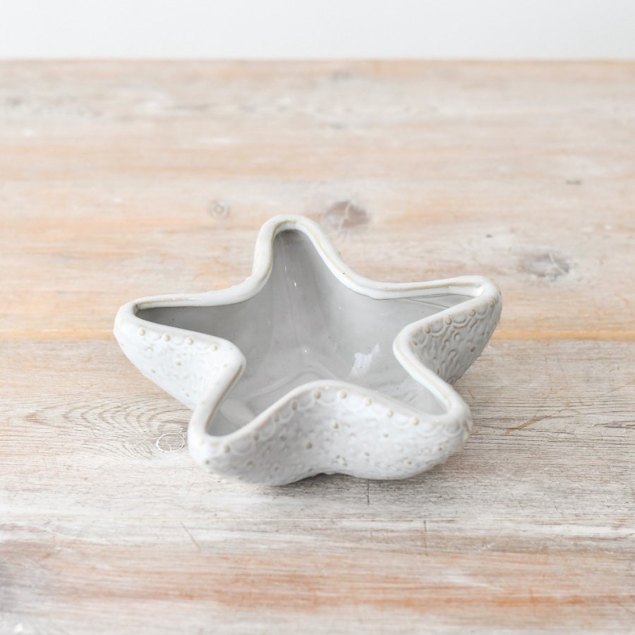 Elevate any space with this stunning glazed starfish bowl, perfect for a touch of coastal charm. 