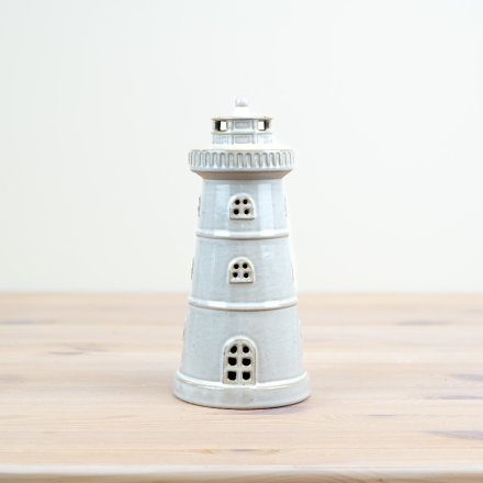 Illuminate your home with our charming Lighthouse Ornament! 