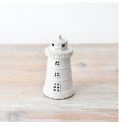 Light up your home with the charming LED Lighthouse - the perfect addition to any decor. 